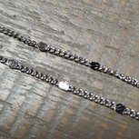 RVS 1.5mm schakerketting met decoratieschijfje