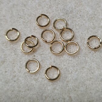 DQ  jumpring 4x0.7mm goud