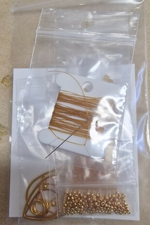 Zelfmaakpakket Oorhangers goud met gele facetkralen