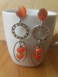 Zilveren oorhangers met steker oranje facetkralen Zilveren oorhangers met steker oranje facetkralen